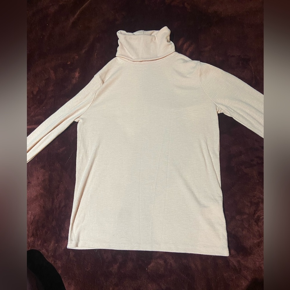 Light pink turtleneck sweater